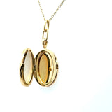Monica Rich Kosann 18KT yellow gold mother of pearl oval locket KFK Jewelers Los Angeles