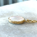 Monica Rich Kosann 18KT yellow gold mother of pearl oval locket KFK Jewelers Los Angeles