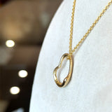 Tiffany Elsa Peretti 18KT yellow gold open heart pendant with pouch KFK Jewelers Los Angeles