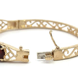 Vintage 14KT Yellow Gold Garnet Bangle Bracelet