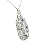 Vintage 1930's pendant with 1CT old European-cut diamonds and blue sapphire accents in 18KT white gold filigree KFK Jewelers Los Angeles 
