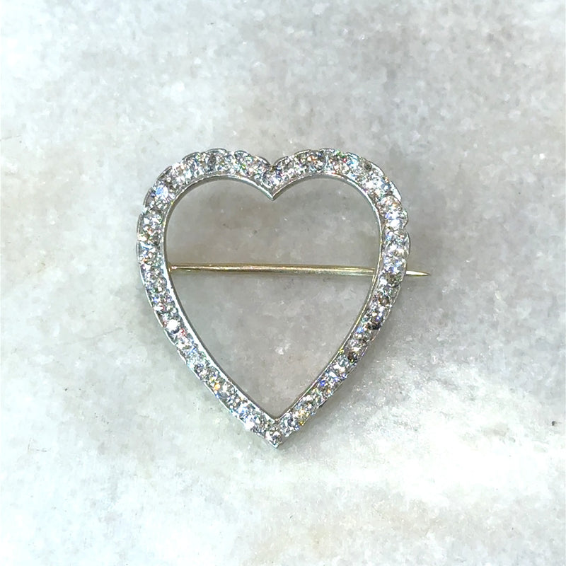 Vintage 1950's heart-shaped 1.70CT diamond brooch crafted in platinum and 18KT yellow gold KFK Jewelers Los Angeles