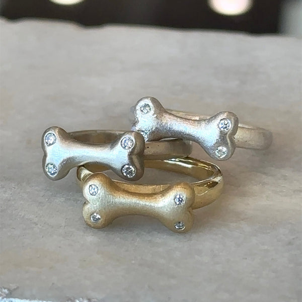 made-to-order dog bone ring Bones for Hope collection 14KT yellow gold, white gold, rose gold, sterling silver with four round diamonds. Ten percent of Bones for Hope item sales go directly to The Lange Foundation to aid their dog rescue and animal welfare efforts. Jewelry or gift for dog lover, dog mom, dog dad KFK Jewelers Los Angeles