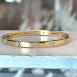 18KT yellow gold Roberto Coin Love in Verona diamond accent bangle bracelet .15CT round diamonds 4.5mm wide KFK Jewelers Los Angeles