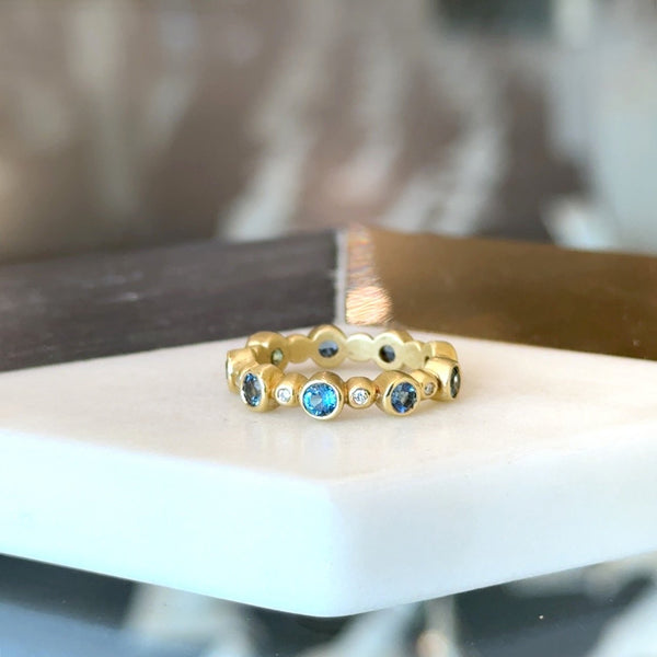 Suzy Landa 18KT Yellow Gold Bezeled Blue Tourmaline and Diamond Eternity Band - KFK Jewelers, Inc.