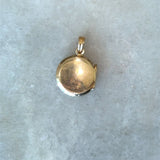 Vintage 1950s 10KT yellow gold round locket with floral design KFK Jewelers Los Angeles