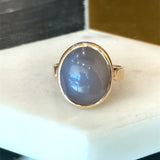 Vintage 1970s 14KT yellow gold bezel-set oval moonstone ring KFK Jewelers Los Angeles