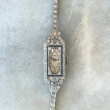 Vintage 1930's Art Deco Platinum Diamond Watch with 1.20CT round diamonds and blue French-cut sapphires KFK Jewelers Los Angeles