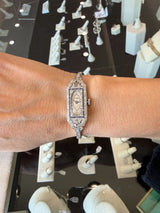 Vintage 1930's Art Deco Platinum Diamond Watch with 1.20CT round diamonds and blue French-cut sapphires KFK Jewelers Los Angeles
