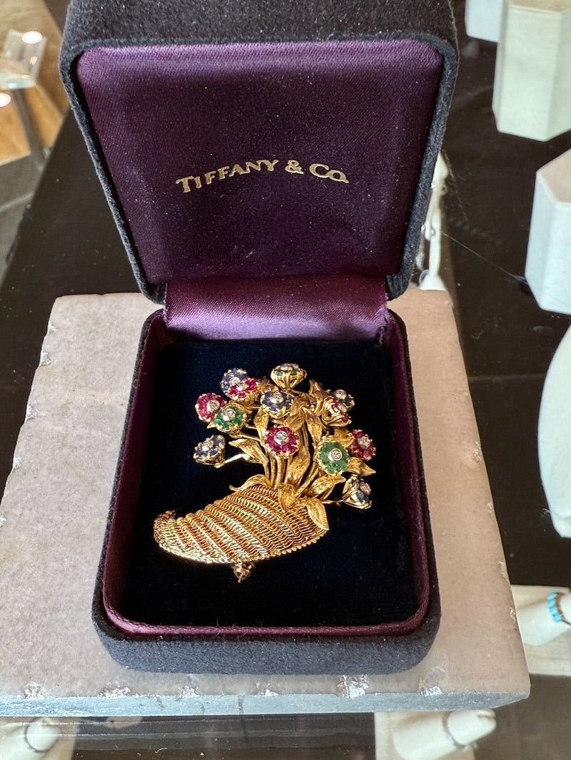 Vintage Tiffany & Co. 18K yellow gold cornucopia brooch pin with flowers "en tremblant" crafted in sapphires, emeralds, and rubies with a diamond center KFK Jewelers Los Angeles