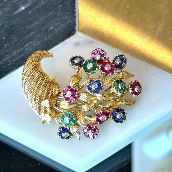 Vintage Tiffany & Co. 18K yellow gold cornucopia brooch pin with flowers "en tremblant" crafted in sapphires, emeralds, and rubies with a diamond center KFK Jewelers Los Angeles