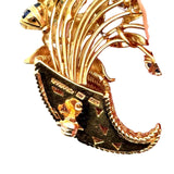 Vintage Tiffany & Co. 18K yellow gold cornucopia brooch pin with flowers "en tremblant" crafted in sapphires, emeralds, and rubies with a diamond center KFK Jewelers Los Angeles