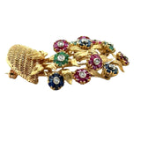Vintage Tiffany & Co. 18K yellow gold cornucopia brooch pin with flowers "en tremblant" crafted in sapphires, emeralds, and rubies with a diamond center KFK Jewelers Los Angeles