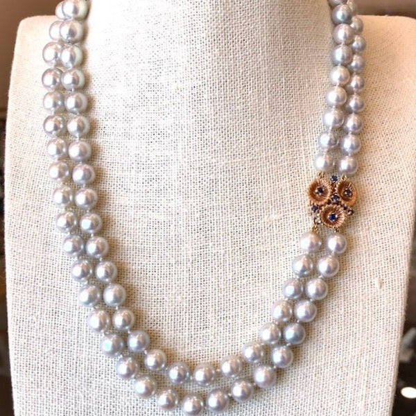 DOUBLE STRAND OF FAUX PEARLS VTG 1950’s PEARLS ON CLASP (SOUND FAMILIAR?)